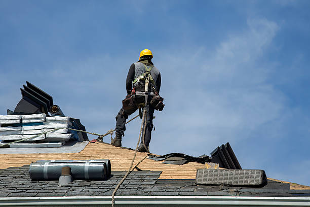Professional Roofing technician working in Malverne, NY